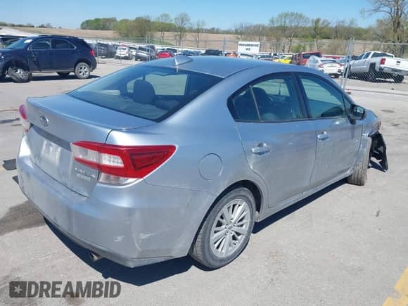 2017 Subaru Impreza Premium with VIN 4S3GKAB62H3614090, listed as a IAAI auction lot 42184020 with 137,158 mi miles and . Bid and sale history available at DreamBid. Image 4.