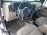 2001 Jeep Wrangler SE with VIN 1J4FA29P41P315163, listed as a Copart auction lot 87490904 with Not provided miles and Clean title. Bid and sale history available at DreamBid. Image 8.