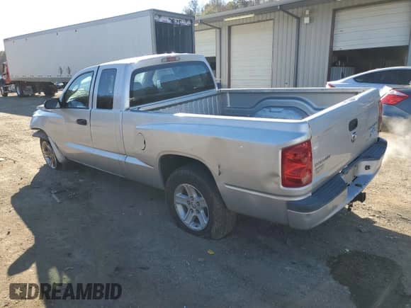 2010 Dodge Dakota z VIN 1D7CE3BK1AS221083, wystawiony jako Copart lot #83998494 z przebiegiem 280 749 mil mil oraz Szkoda całkowita • Salvage title. Historia ofert i sprzedaży dostępna na DreamBid. Obrazek 2.