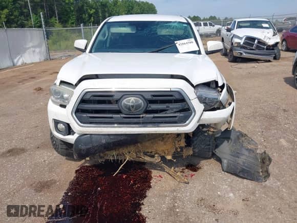 2018 Toyota Tacoma SR5 с VIN 5TFBZ5DN7JX004248, выставлен на аукционе IAAI как лот 42864580 с пробегом 210 482 миль миль и . История ставок и продаж доступна на DreamBid. Изображение 6.
