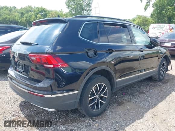 2021 Volkswagen Tiguan SE with VIN 3VV3B7AX8MM045106, listed as a IAAI auction lot 42615167 with 94,729 mi miles and . Bid and sale history available at DreamBid. Image 4.