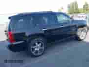 2008 Chevrolet Tahoe LTZ with VIN 1GNFK13098J143578, listed as a IAAI auction lot 42549671 with 208,738 mi miles and . Bid and sale history available at DreamBid. Image 4.