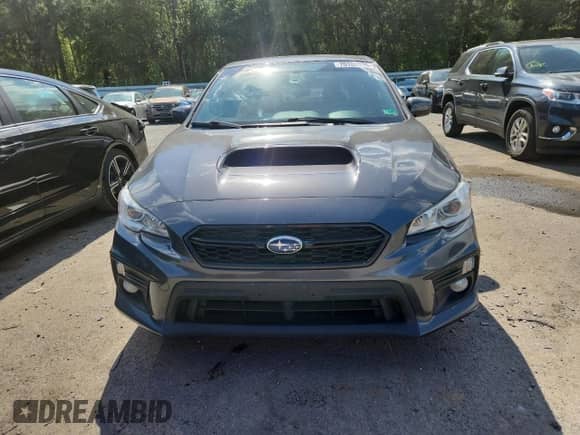 2021 Subaru WRX Premium with VIN JF1VA1C61M9813184, listed as a Copart auction lot 70188015 with 83,781 mi miles and Salvage title. Bid and sale history available at DreamBid. Image 5.