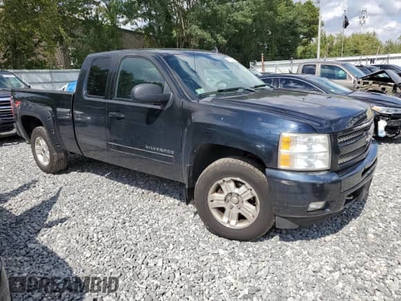 2011 Chevrolet Silverado 1500 LTZ with VIN 1GCRKTE37BZ426448, listed as a Copart auction lot 71725715 with 153,563 mi miles and Clean title. Bid and sale history available at DreamBid. Image 4.
