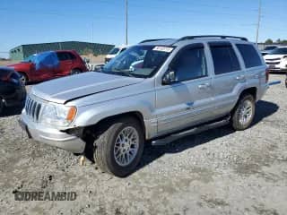 2002 Jeep Grand Cherokee Limited с VIN 1J4GX58S72C259349, выставлен на аукционе Copart как лот 88763715 с пробегом 165 282 миль миль и Списание • Salvage title. История ставок и продаж доступна на DreamBid. Изображение 1.