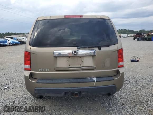 2011 Honda Pilot LX z VIN 5FNYF3H2XBB024268, wystawiony jako Copart lot #81864065 z przebiegiem 243 782 mil mil oraz Czysty tytuł • Clean title. Historia ofert i sprzedaży dostępna na DreamBid. Obrazek 6.