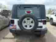 2015 Jeep Wrangler Sport with VIN 1C4AJWAG8FL606900, listed as a IAAI auction lot 42119626 with 119,268 mi miles and . Bid and sale history available at DreamBid. Image 17.