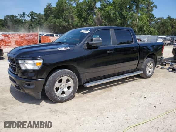 2021 Ram 1500 Big Horn with VIN 1C6RREFM6MN814934, listed as a Copart auction lot 57633925 with 57,154 mi miles and Salvage title. Bid and sale history available at DreamBid. Image 1.