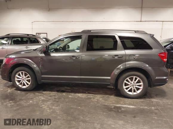 2015 Dodge Journey SXT with VIN 3C4PDDBG3FT596818, listed as a IAAI auction lot 42722530 with 148,968 mi miles and . Bid and sale history available at DreamBid. Image 15.