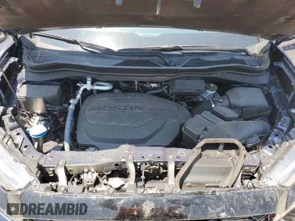 2023 Honda Passport Elite with VIN 5FNYF8H0XPB033491, listed as a Copart auction lot 57640815 with 19,628 mi miles and Salvage title. Bid and sale history available at DreamBid. Image 12.