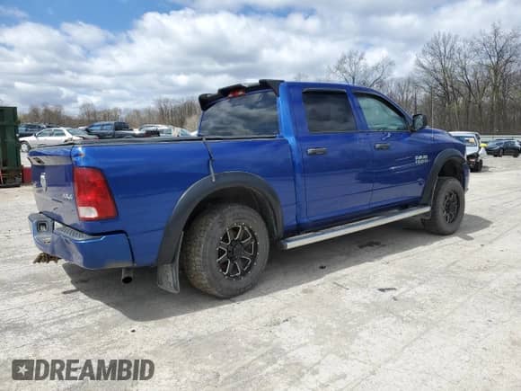 2015 Ram 1500 Express with VIN 1C6RR7KG2FS516851, listed as a Copart auction lot 52009265 with 225,211 mi miles and Salvage title. Bid and sale history available at DreamBid. Image 3.