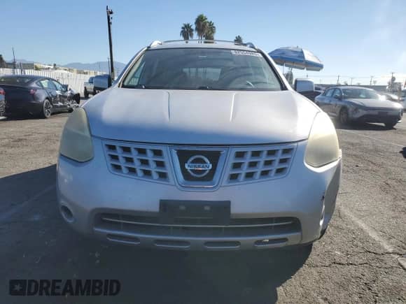 2010 Nissan Rogue SL с VIN JN8AS5MT7AW010575, выставлен на аукционе Copart как лот 82554985 с пробегом 191 740 миль миль и Списание • Salvage title. История ставок и продаж доступна на DreamBid. Изображение 5.