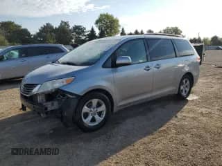 2011 Toyota Sienna LE with VIN 5TDKK3DCXBS142400, listed as a Copart auction lot 71993155 with 159,056 mi miles and Salvage title. Bid and sale history available at DreamBid. Image 1.