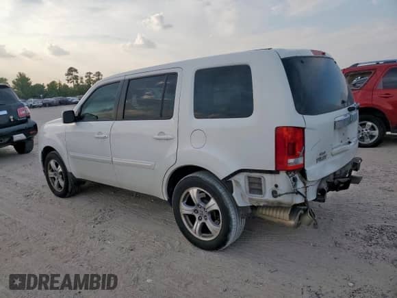 2014 Honda Pilot EX-L with VIN 5FNYF3H56EB001925, listed as a Copart auction lot 80243515 with 119,891 mi miles and Salvage title. Bid and sale history available at DreamBid. Image 2.