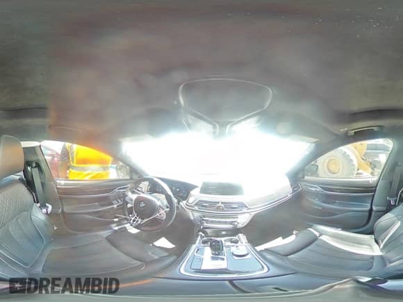 2016 BMW 7 Series 750i xDrive с VIN WBA7F2C59GG417311, выставлен на аукционе Copart как лот 61777655 с пробегом 103 374 миль миль и Списание • Salvage title. История ставок и продаж доступна на DreamBid. Изображение 14.