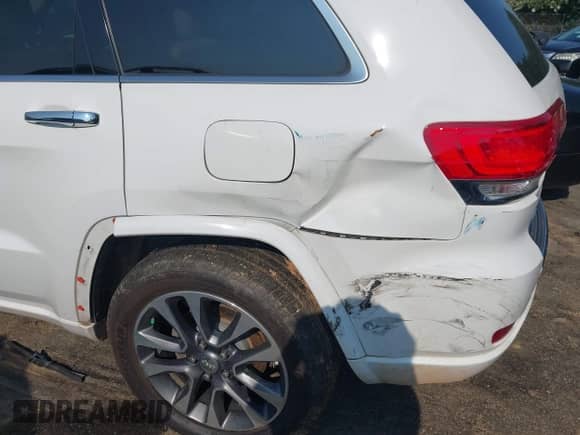 2017 Jeep Grand Cherokee Overland with VIN 1C4RJFCG1HC633004, listed as a IAAI auction lot 42672905 with 138,018 mi miles and . Bid and sale history available at DreamBid. Image 19.