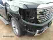 2023 GMC Sierra 1500 Denali with VIN 1GTUUGED7PZ123360, listed as a IAAI auction lot 40536949 with 46,418 mi miles and . Bid and sale history available at DreamBid. Image 6.
