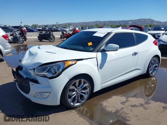 2014 Hyundai Veloster z VIN KMHTC6AD4EU213537, wystawiony jako IAAI lot #43358808 z przebiegiem 54 973 mil mil oraz . Historia ofert i sprzedaży dostępna na DreamBid. Obrazek 17.