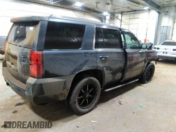 2019 Chevrolet Tahoe LS with VIN 1GNSKAEC6KR121486, listed as a IAAI auction lot 41064193 with 118,108 mi miles and . Bid and sale history available at DreamBid. Image 4.