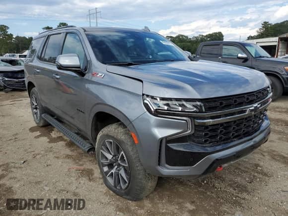 2022 Chevrolet Tahoe Z71 с VIN 1GNSKPKD4NR312103, выставлен на аукционе Copart как лот 83826915 с пробегом 31 561 миль миль и Списание • Salvage title. История ставок и продаж доступна на DreamBid. Изображение 4.