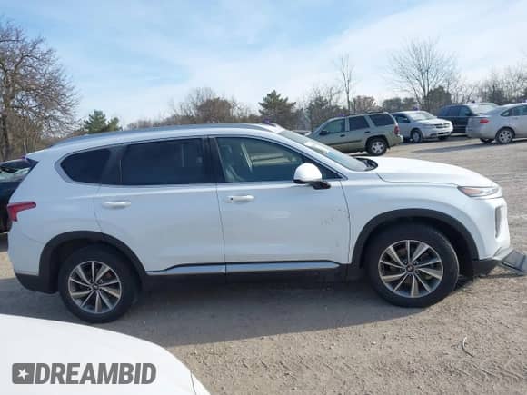 2019 Hyundai Santa Fe SEL with VIN 5NMS3CAD4KH018717, listed as a IAAI auction lot 41240409 with 116,871 mi miles and . Bid and sale history available at DreamBid. Image 13.