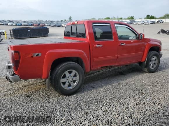 2011 Chevrolet Colorado 2LT with VIN 1GCHSDFE0B8129335, listed as a Copart auction lot 54870115 with 185,357 mi miles and Salvage title. Bid and sale history available at DreamBid. Image 3.