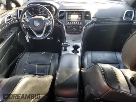 2015 Jeep Grand Cherokee High Altitude with VIN 1C4RJECG1FC231961, listed as a Copart auction lot 82002425 with 122,290 mi miles and Salvage title. Bid and sale history available at DreamBid. Image 8.