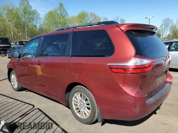 2016 Toyota Sienna LE with VIN 5TDJK3DC5GS132571, listed as a Copart auction lot 55155505 with 143,294 mi miles and Salvage title. Bid and sale history available at DreamBid. Image 2.