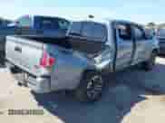2021 Toyota Tacoma SR5 z VIN 5TFAZ5CN4MX097831, wystawiony jako IAAI lot #43320227 z przebiegiem 31 588 mil mil oraz . Historia ofert i sprzedaży dostępna na DreamBid. Obrazek 4.