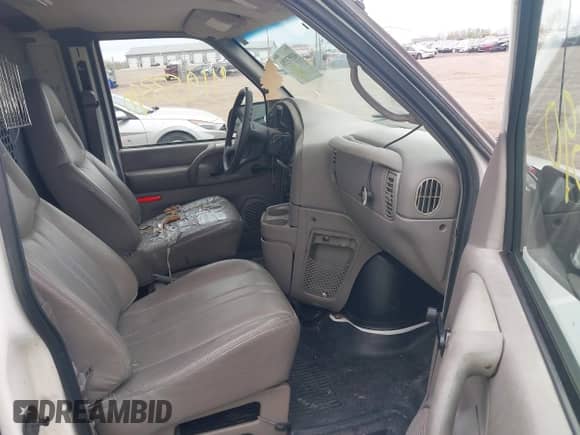 2002 Chevrolet Astro Cargo z VIN 1GCDM19X92B120737, wystawiony jako IAAI lot #41953390 z przebiegiem 256 316 mil mil oraz . Historia ofert i sprzedaży dostępna na DreamBid. Obrazek 5.