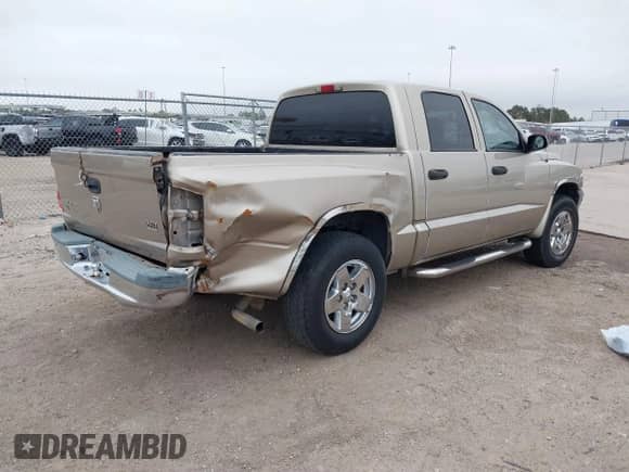 2005 Dodge Dakota SLT with VIN 1D7HE48N45S337753, listed as a IAAI auction lot 41084928 with 177,018 mi miles and . Bid and sale history available at DreamBid. Image 4.