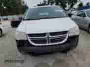 2013 Dodge Grand Caravan SE with VIN 2C4RDGBG5DR506482, listed as a Copart auction lot 83921775 with 124,348 mi miles and Salvage title. Bid and sale history available at DreamBid. Image 5.