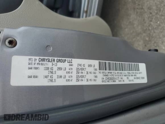 2014 Dodge Grand Caravan American Value with VIN 2C4RDGBG2ER141177, listed as a Copart auction lot 58329325 with 230,825 mi miles and Clean title. Bid and sale history available at DreamBid. Image 13.
