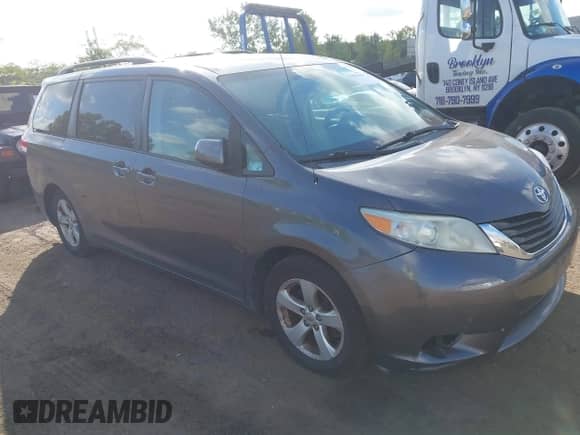 2012 Toyota Sienna LE AAS with VIN 5TDKK3DC2CS215910, listed as a IAAI auction lot 43063000 with 169,580 mi miles and . Bid and sale history available at DreamBid. Image 1.