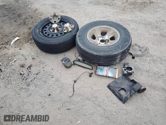 1999 Chevrolet Blazer LS z VIN 1GNCS13W0X2133425, wystawiony jako Copart lot #81930324 z przebiegiem 224 669 mil mil oraz Szkoda całkowita • Salvage title. Historia ofert i sprzedaży dostępna na DreamBid. Obrazek 14.