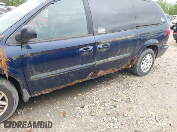 2003 Dodge Caravan Sport with VIN 1D4GP44R23B301939, listed as a IAAI auction lot 42965650 with 165,966 mi miles and . Bid and sale history available at DreamBid. Image 6.
