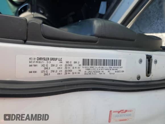 2014 Jeep Grand Cherokee Summit with VIN 1C4RJFJT4EC523334, listed as a Copart auction lot 70189445 with 85,386 mi miles and Salvage title. Bid and sale history available at DreamBid. Image 13.