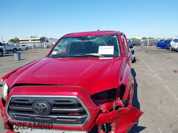 2018 Toyota Tacoma SR with VIN 5TFRX5GN4JX120443, listed as a IAAI auction lot 42755579 with 63,186 mi miles and . Bid and sale history available at DreamBid. Image 6.