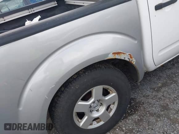 2007 Nissan Frontier Nismo with VIN 1N6AD07W17C438468, listed as a IAAI auction lot 42865514 with 122,822 mi miles and . Bid and sale history available at DreamBid. Image 6.