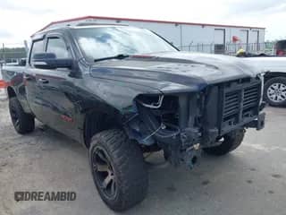 2019 Ram 1500 Rebel with VIN 1C6SRFET1KN661716, listed as a IAAI auction lot 42729472 with 140,280 mi miles and . Bid and sale history available at DreamBid. Image 1.