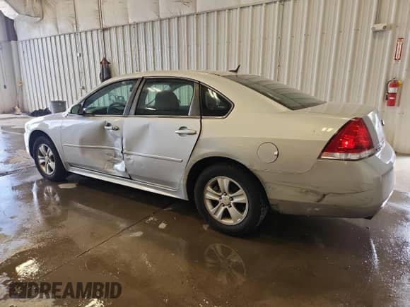 2014 Chevrolet Impala LS с VIN 2G1WA5E39E1170210, выставлен на аукционе Copart как лот 84045825 с пробегом 141 027 миль миль и На запчасти • Non repairable. История ставок и продаж доступна на DreamBid. Изображение 2.