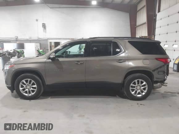 2019 Chevrolet Traverse LT Cloth z VIN 1GNEVGKW6KJ210172, wystawiony jako IAAI lot #42695664 z przebiegiem 68 424 mil mil oraz . Historia ofert i sprzedaży dostępna na DreamBid. Obrazek 15.