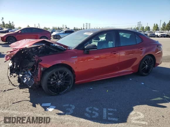 2021 Toyota Camry Hybrid XSE with VIN 4T1K31AK6MU022259, listed as a Copart auction lot 70696655 with 155,767 mi miles and Salvage title. Bid and sale history available at DreamBid. Image 1.