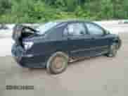 2003 Toyota Corolla CE with VIN 1NXBR32E03Z023604, listed as a Copart auction lot 57520575 with 250,159 mi miles and Salvage title. Bid and sale history available at DreamBid. Image 3.