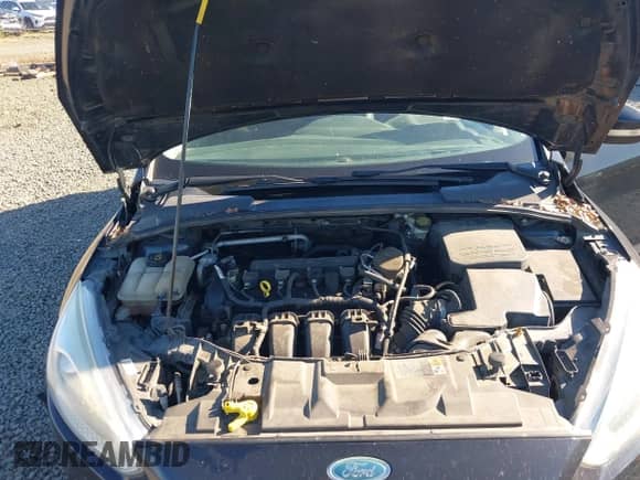 2015 Ford Focus SE z VIN 1FADP3K27FL307174, wystawiony jako IAAI lot #43348790 z przebiegiem 147 075 mil mil oraz . Historia ofert i sprzedaży dostępna na DreamBid. Obrazek 10.