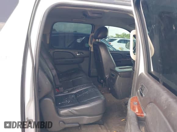 2011 Chevrolet Suburban LT with VIN 1GNSCJE09BR150452, listed as a IAAI auction lot 42655961 with 208,311 mi miles and . Bid and sale history available at DreamBid. Image 8.