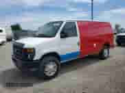 2011 Ford Econoline Cargo Commercial z VIN 1FTSE3EL3BDA38770, wystawiony jako Copart lot #63881715 z przebiegiem 153 607 mil mil oraz Czysty tytuł • Clean title. Historia ofert i sprzedaży dostępna na DreamBid. Obrazek 1.