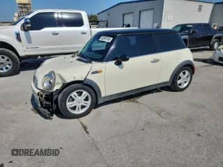 2006 MINI Hardtop with VIN WMWRC33556TJ77431, listed as a Copart auction lot 80389785 with Not provided miles and Salvage title. Bid and sale history available at DreamBid. Image 1.