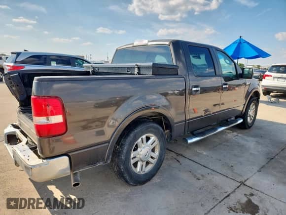 2007 Ford F-150 XLT with VIN 1FTPW12V97FA19603, listed as a Copart auction lot 80511855 with 276,048 mi miles and Salvage title. Bid and sale history available at DreamBid. Image 3.