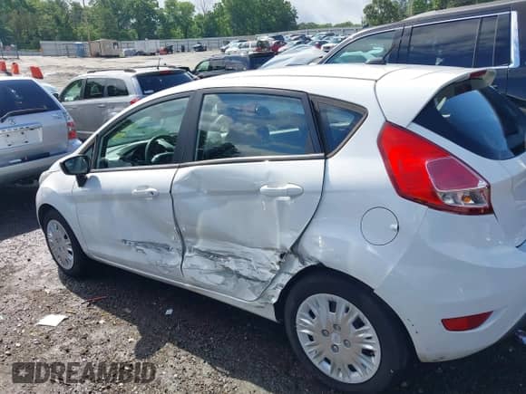 2015 Ford Fiesta S with VIN 3FADP4TJ8FM122710, listed as a IAAI auction lot 42223606 with 91,769 mi miles and . Bid and sale history available at DreamBid. Image 14.
